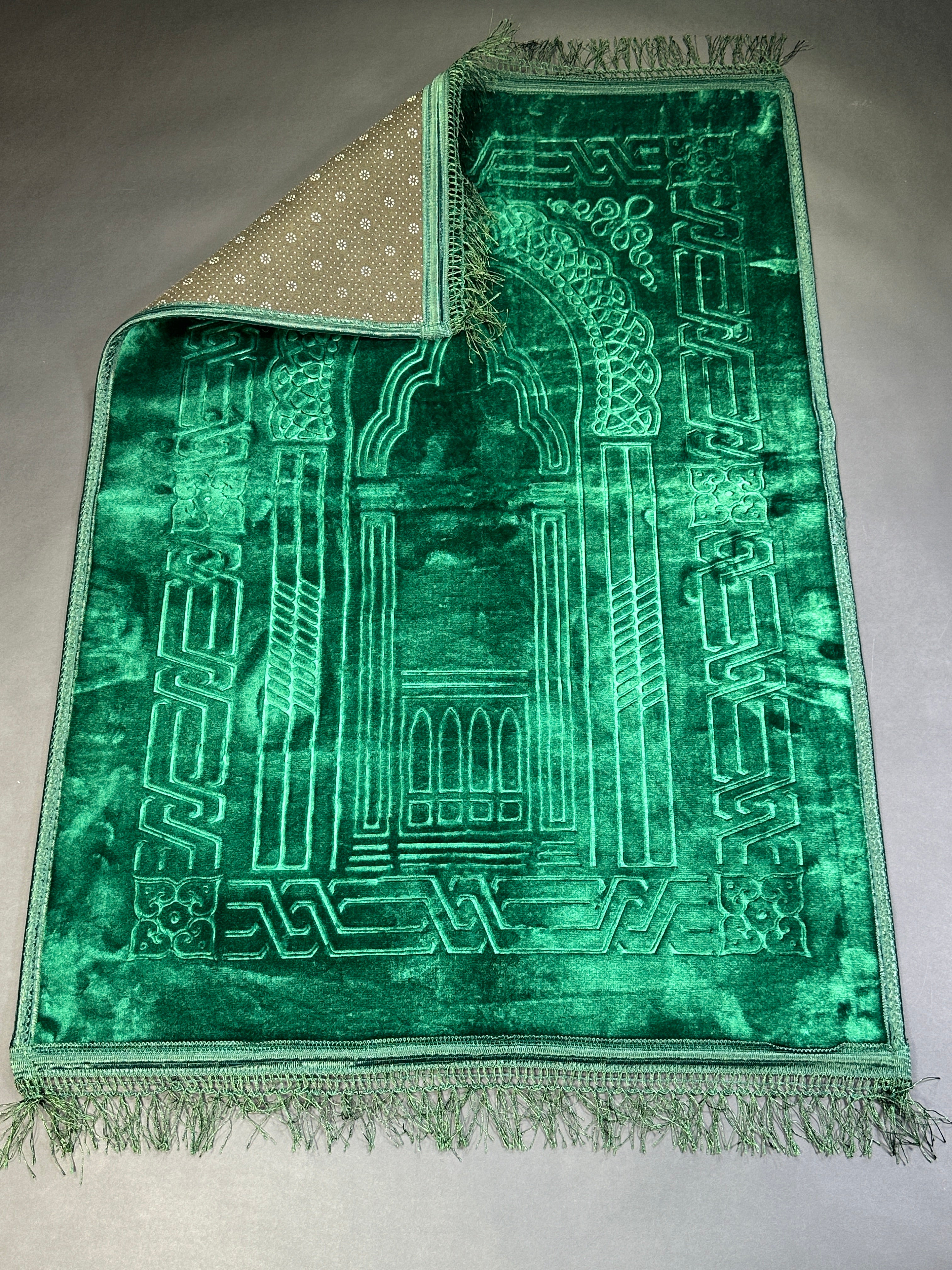 Luxury green prayer mat folded